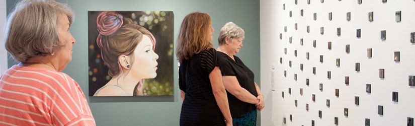 Patrons at gallery show Patrons at gallery show